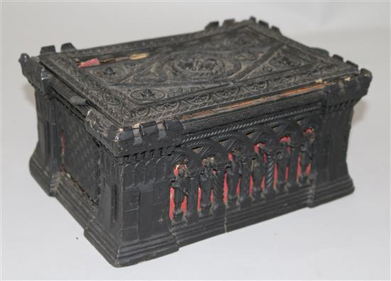 A Staunton ebony and boxwood chess set by Jaques of London, in carton pierre casket, (a.f.).